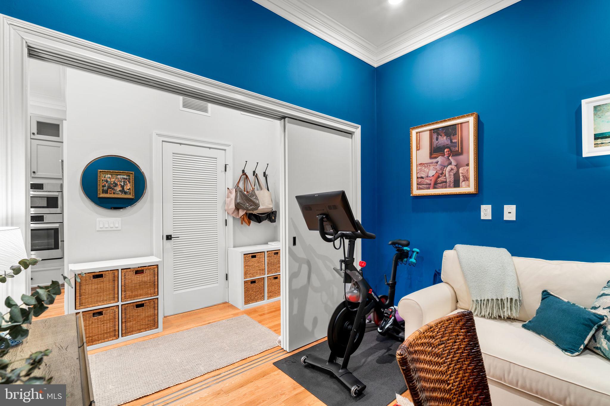 300 8th Street Northeast, Unit 102 Washington, DC 20002 - Photo 14 of 29 a living room with furniture and a flat screen tv