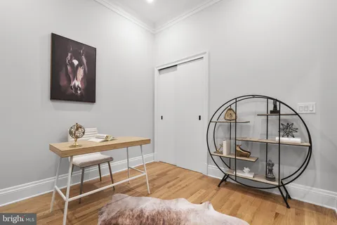 a room with table and a mirror