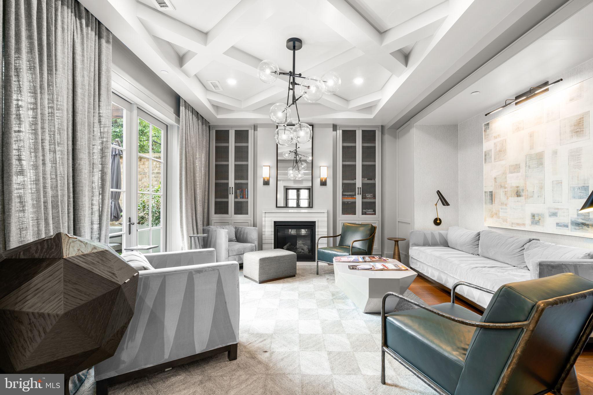 300 8th Street Northeast, Unit 102 Washington, DC 20002 - Photo 6 of 29 a living room with furniture and a large window