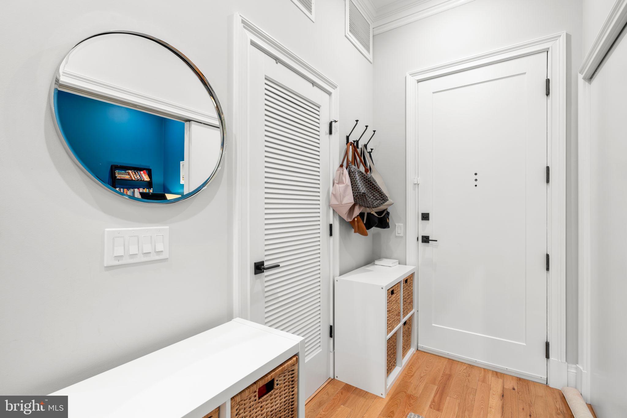 300 8th Street Northeast, Unit 102 Washington, DC 20002 - Photo 10 of 29 a view of a bathroom with a sink and a mirror