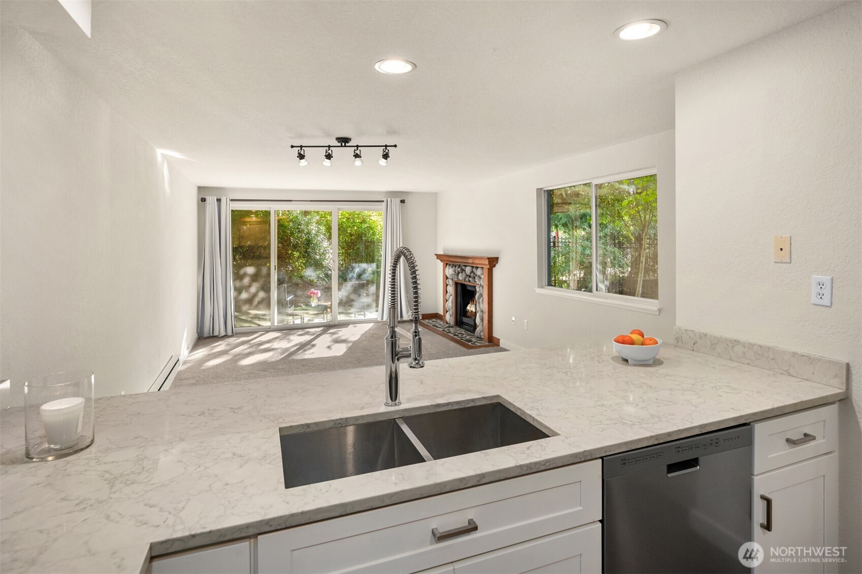 12014 98th Avenue Northeast, Unit 101 Kirkland, WA 98034 - Photo 17 of 33 a kitchen with a sink and a window