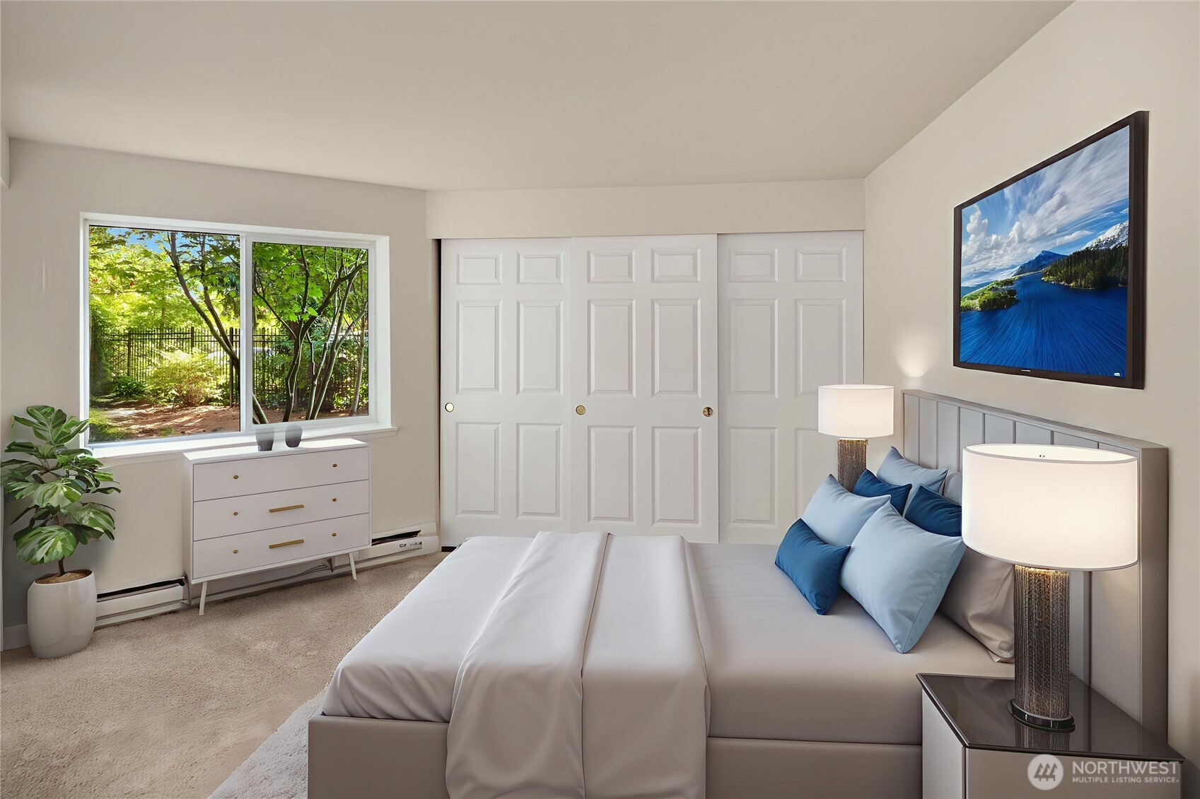 12014 98th Avenue Northeast, Unit 101 Kirkland, WA 98034 - Photo 20 of 33 a bedroom with a bed and a window