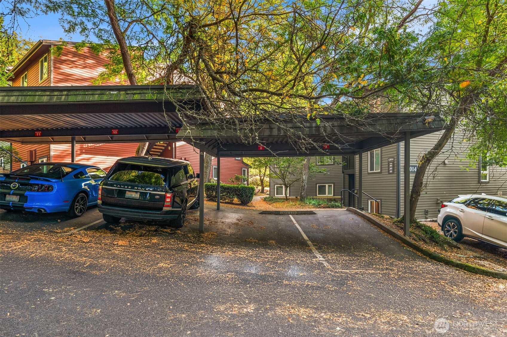 12014 98th Avenue Northeast, Unit 101 Kirkland, WA 98034 - Photo 26 of 33 a view of car parked in parking lot
