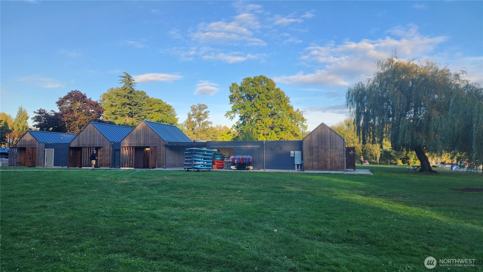 12014 98th Avenue Northeast, Unit 101 Kirkland, WA 98034 - Photo 30 of 33 a view of a big yard with a house in the background