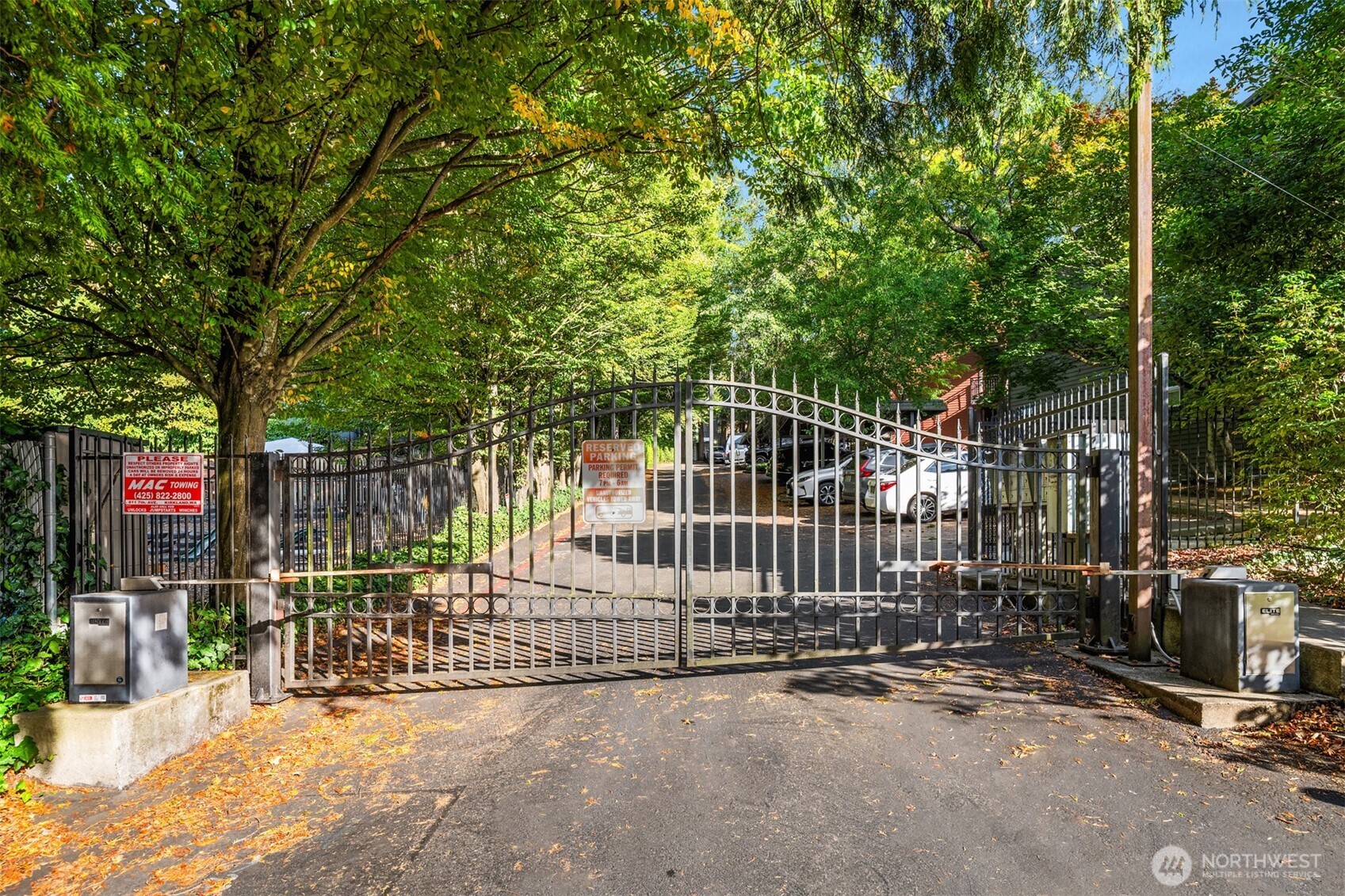 12014 98th Avenue Northeast, Unit 101 Kirkland, WA 98034 - Photo 6 of 33 a view of a park with iron fence