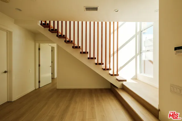 a view of a stairs and an entryway