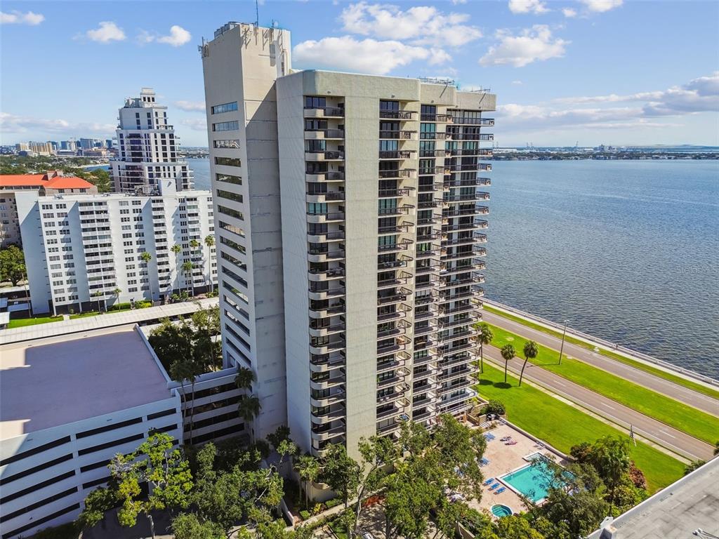 a view of a city with tall buildings