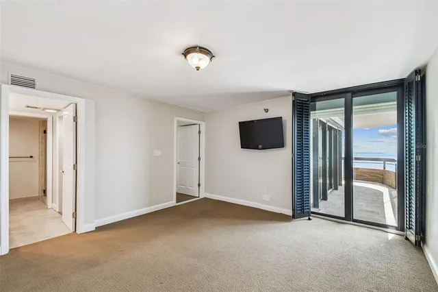 a view of an empty walk in closet