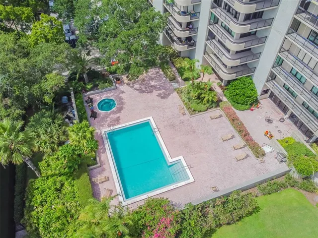 a room with gym equipment and windows