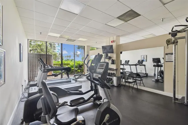 a view of a patio with table and chairs
