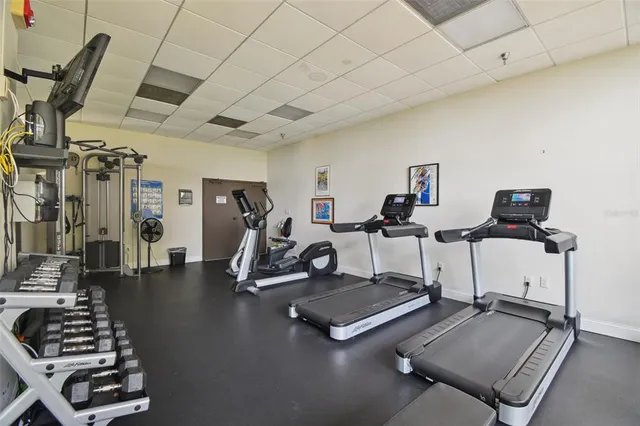 a kitchen with a sink stove and refrigerator
