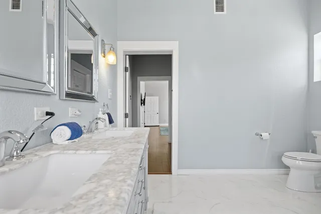 a bathroom with a sink and a toilet