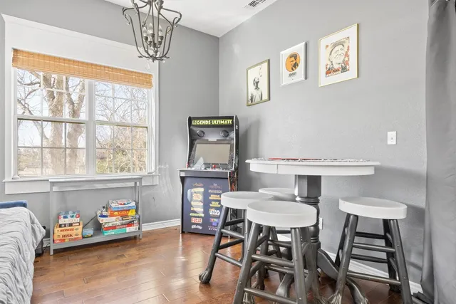 a view of a dining room with furniture window and outside view