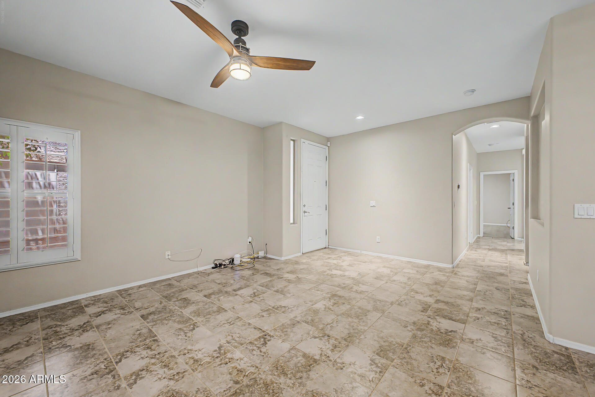 2600 East Springfield Place, Unit 109 Chandler, AZ 85286 - Photo 6 of 38 an empty room with windows