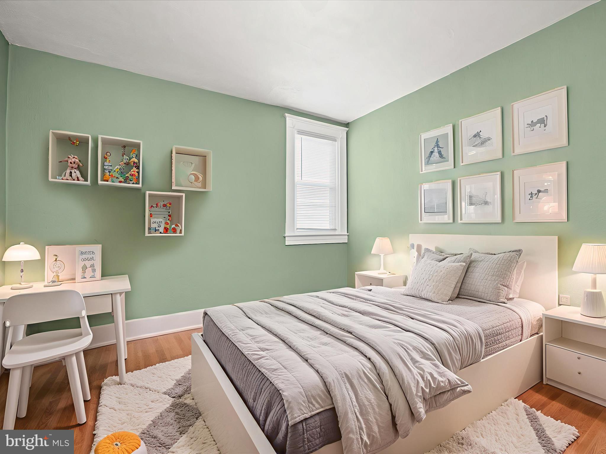 6204 Frederick Road Baltimore, MD 21228 - Photo 30 of 56 a bedroom with a bed and a window
