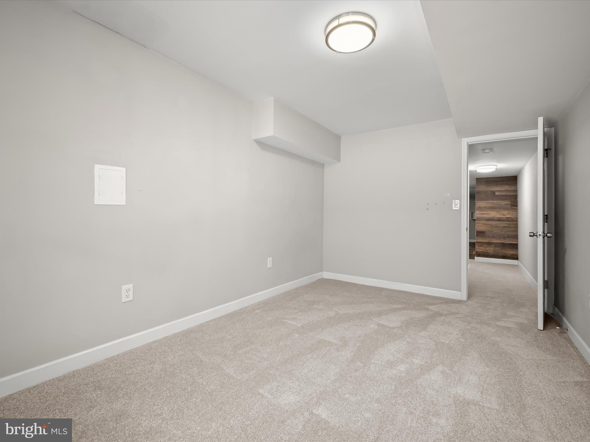 6204 Frederick Road Baltimore, MD 21228 - Photo 45 of 56 an empty room with closet area