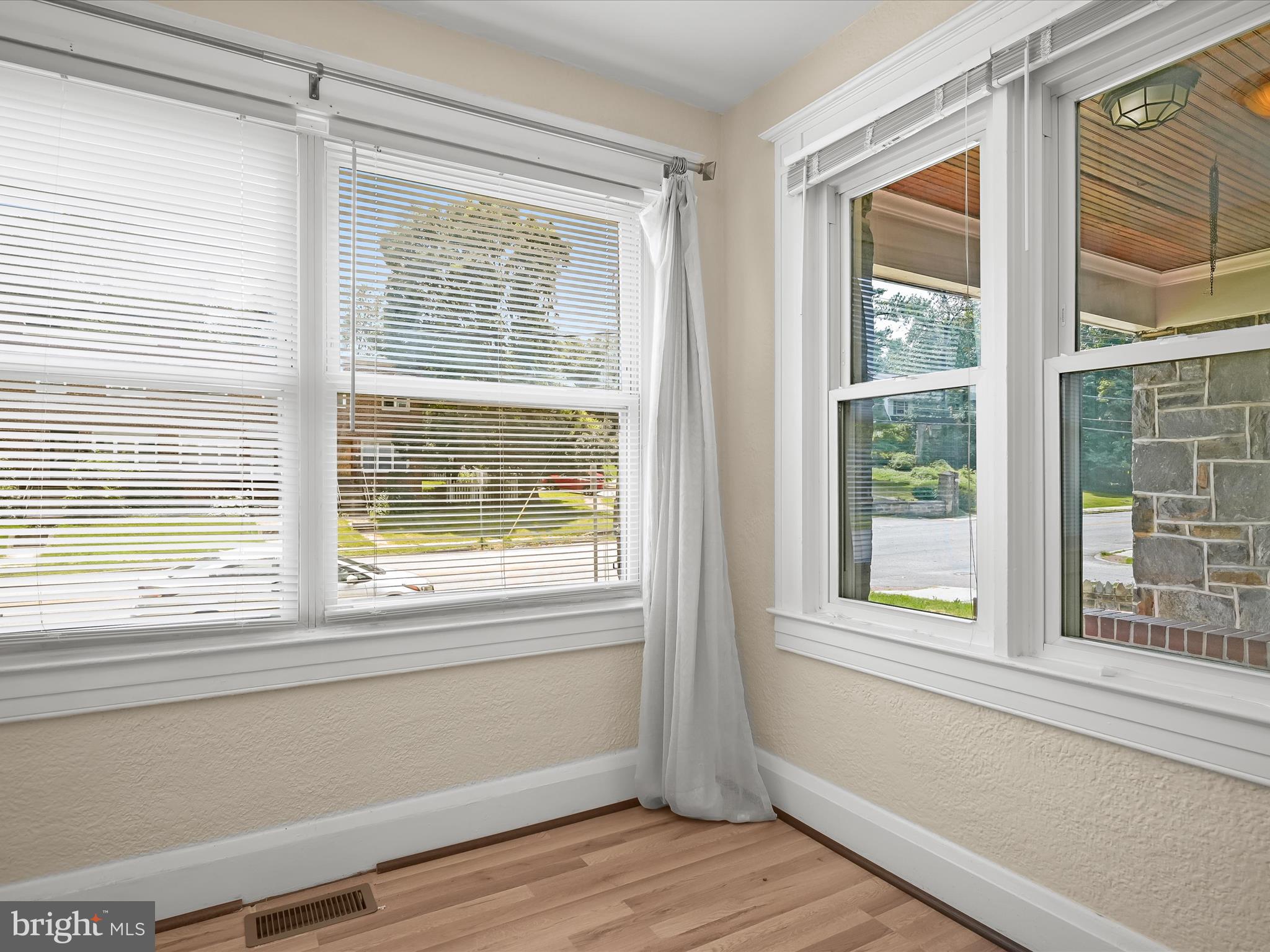 6204 Frederick Road Baltimore, MD 21228 - Photo 10 of 56 a view of a room that has a window