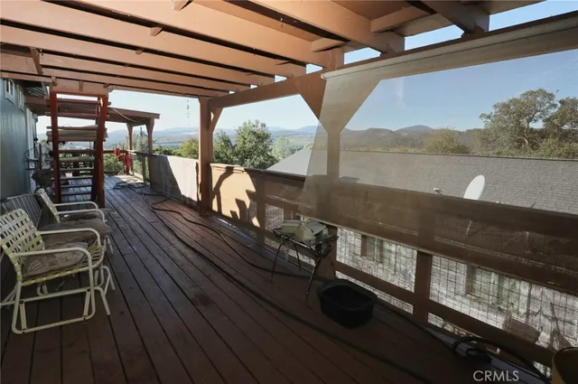 a view of a balcony with chairs