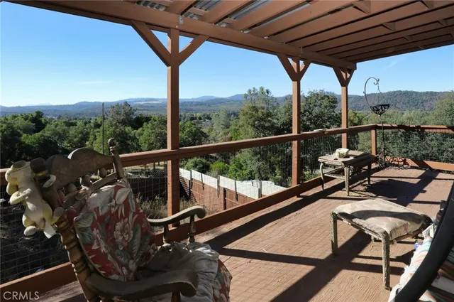 a view of swimming pool from a balcony