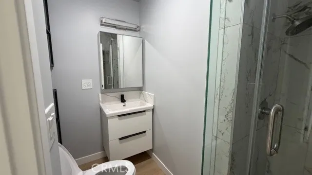 a close view of a utility room with dryer and washer