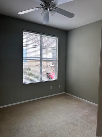 a view of a kitchen with wooden floor and cabinet