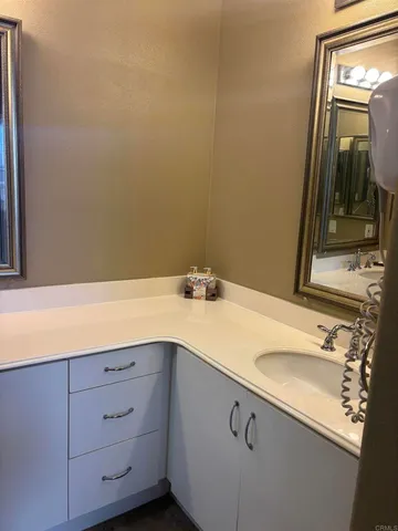 a bathroom with a shower and a toilet