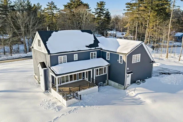 a view of a house with a roof deck