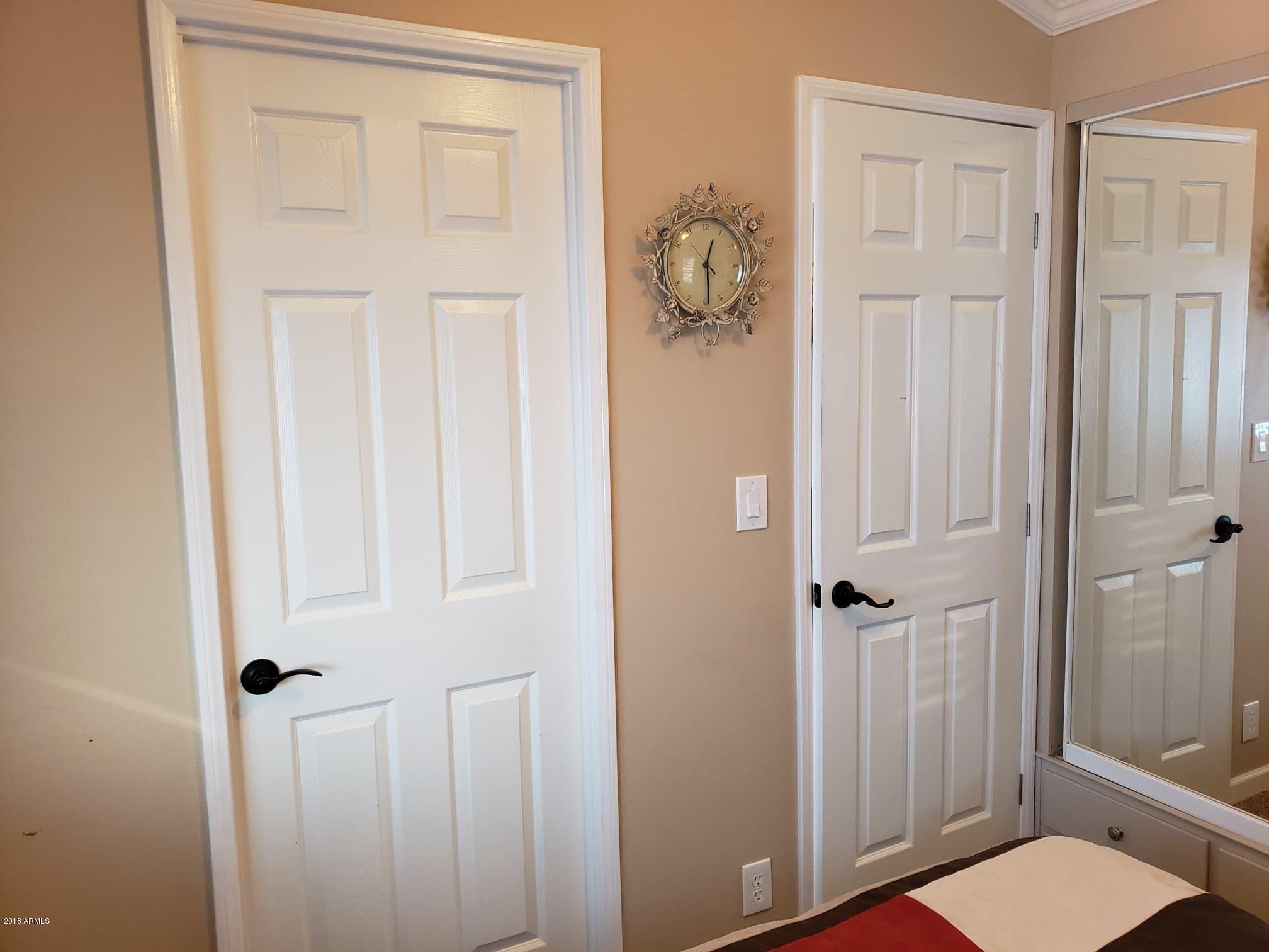 17200 West Bell Road, Unit 836 Surprise, AZ 85374 - Photo 31 of 45 Bedroom Door to Hall and Bathroom