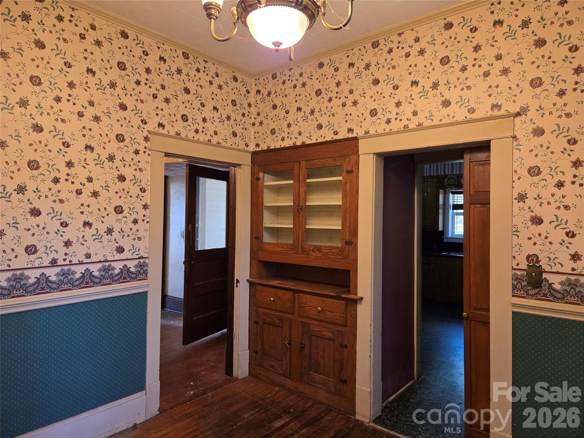 804 Emmanuel Church Road Conover, NC 28613 - Photo 15 of 36 a room with a door and wooden floor