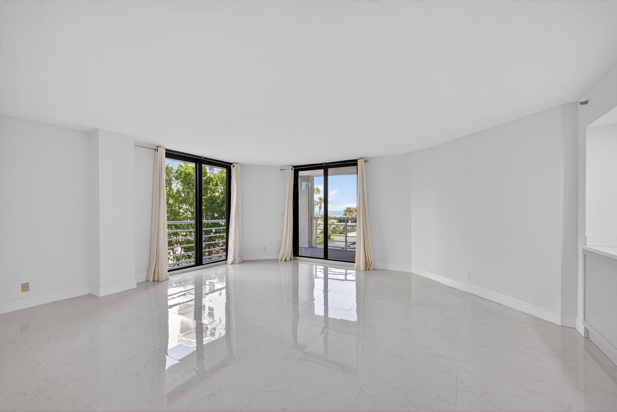 176 Helios Drive, Unit 209 Jupiter, FL 33477 - Photo 19 of 62 an empty room with windows