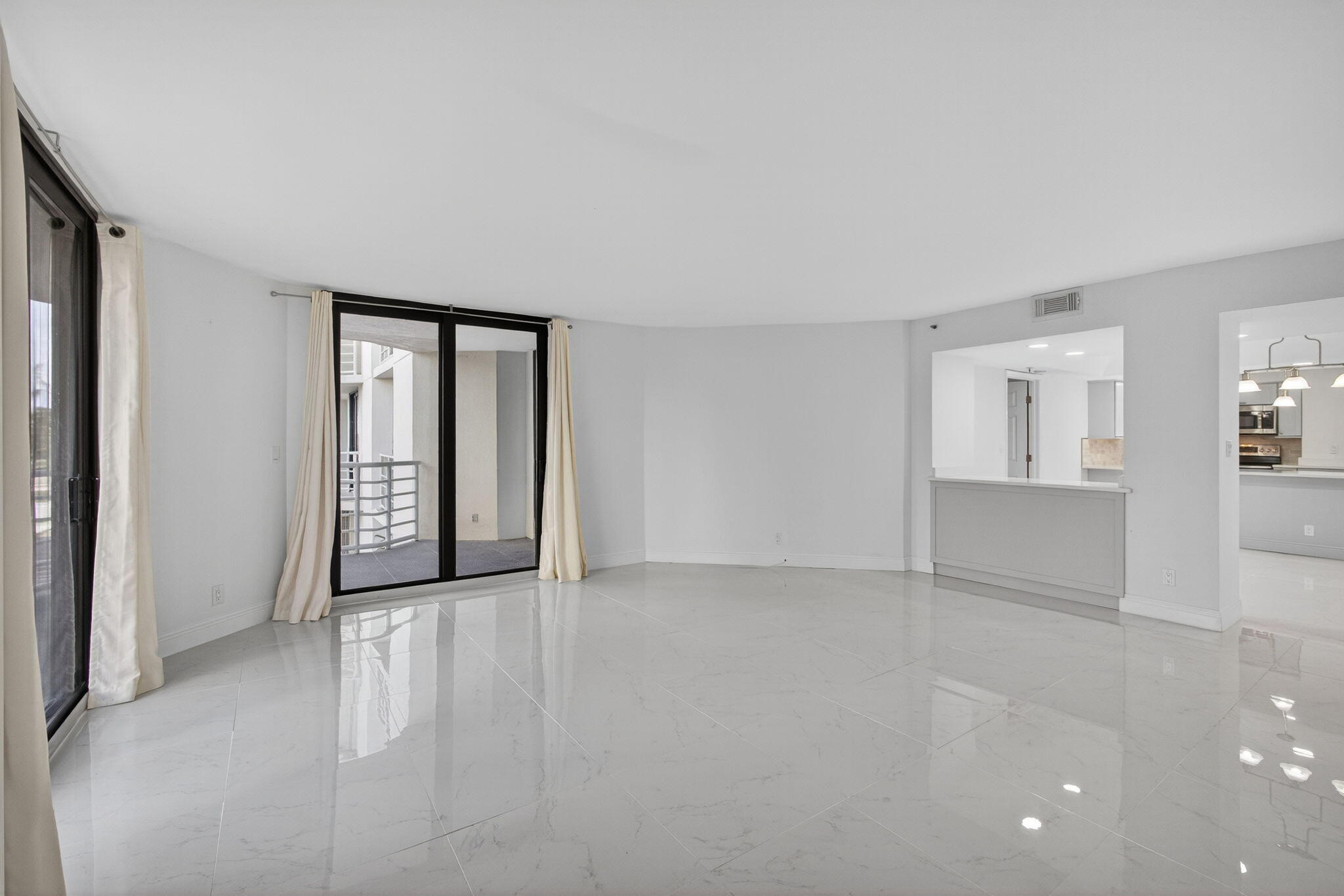 176 Helios Drive, Unit 209 Jupiter, FL 33477 - Photo 22 of 62 a view of an empty room with a window