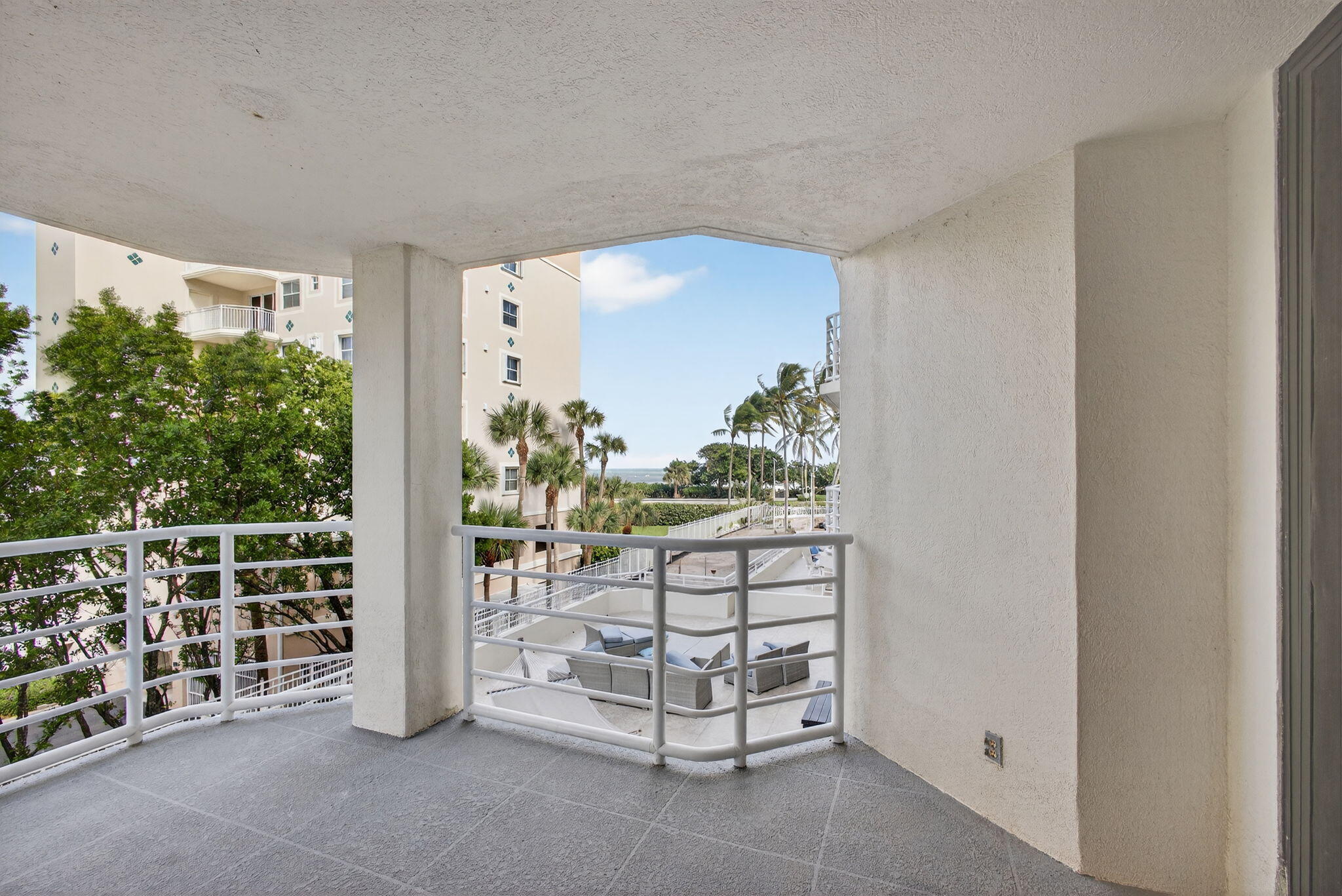 176 Helios Drive, Unit 209 Jupiter, FL 33477 - Photo 36 of 62 a view of porch with outdoor seating