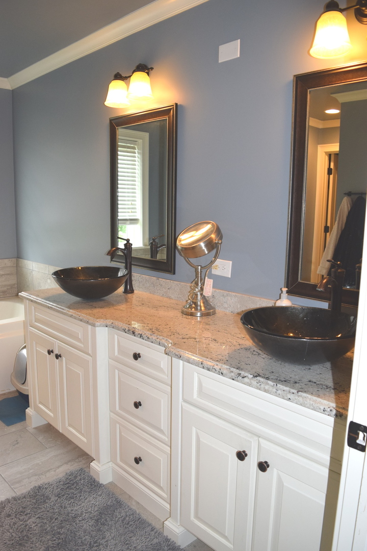 3003 Wayland Avenue Elgin, IL 60124 - Photo 13 of 32 a bathroom with a granite countertop sink and a mirror