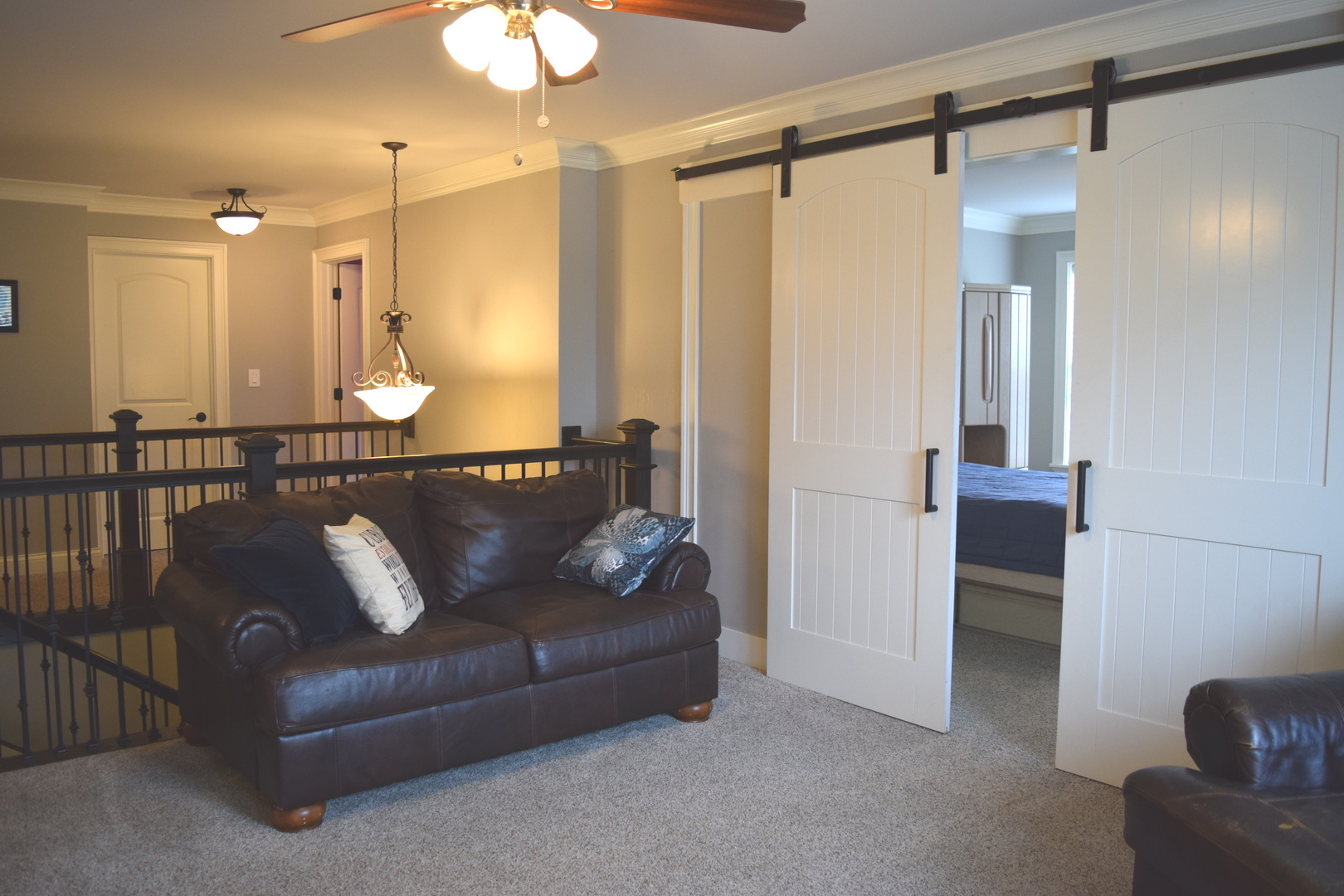 3003 Wayland Avenue Elgin, IL 60124 - Photo 21 of 32 a living room with furniture and a chandelier
