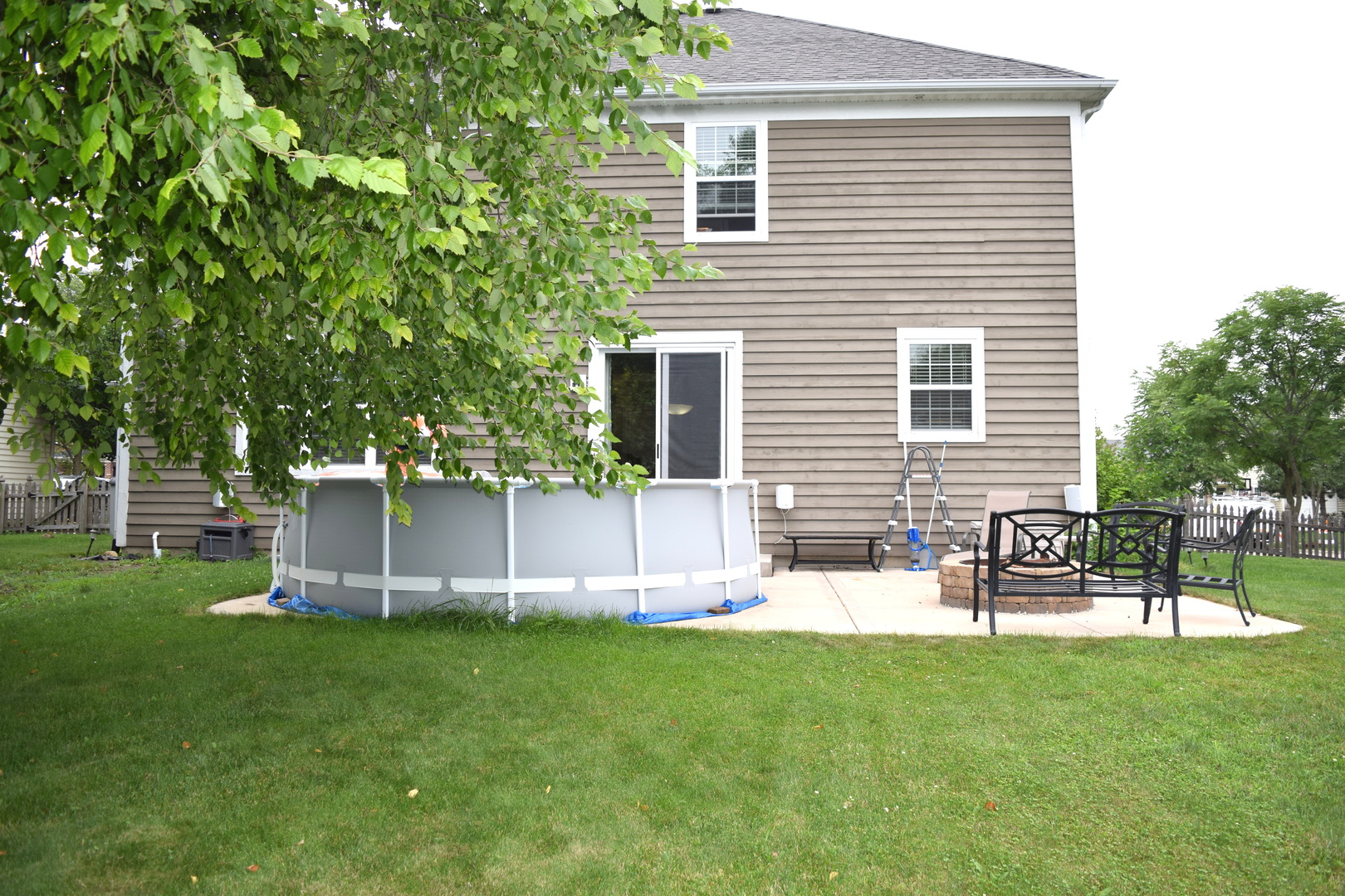 3003 Wayland Avenue Elgin, IL 60124 - Photo 31 of 32 a view of a chair and table in the backyard