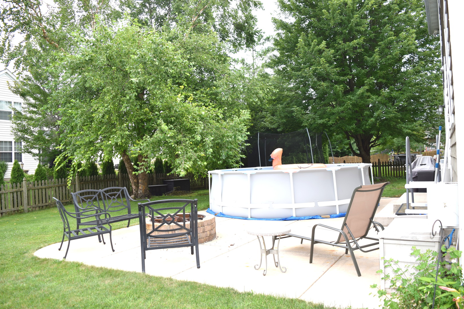 3003 Wayland Avenue Elgin, IL 60124 - Photo 32 of 32 a view of a chairs and table in the back yard of the house