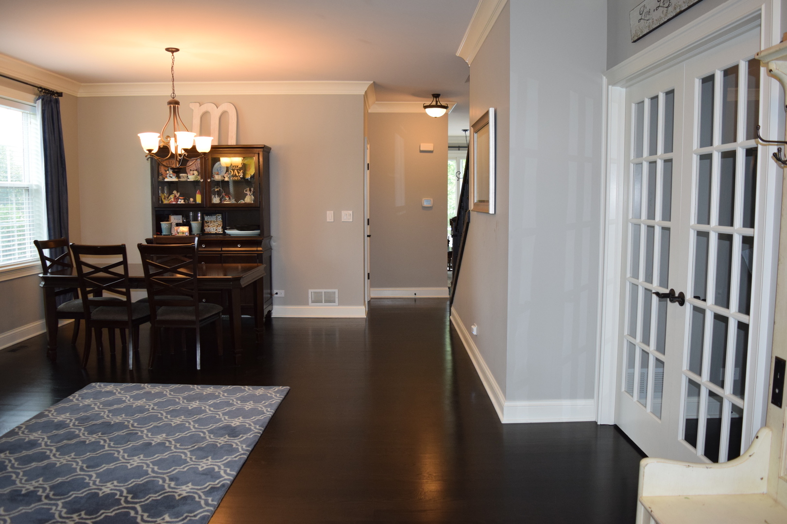 3003 Wayland Avenue Elgin, IL 60124 - Photo 4 of 32 a view of a hallway to a livingroom with furniture