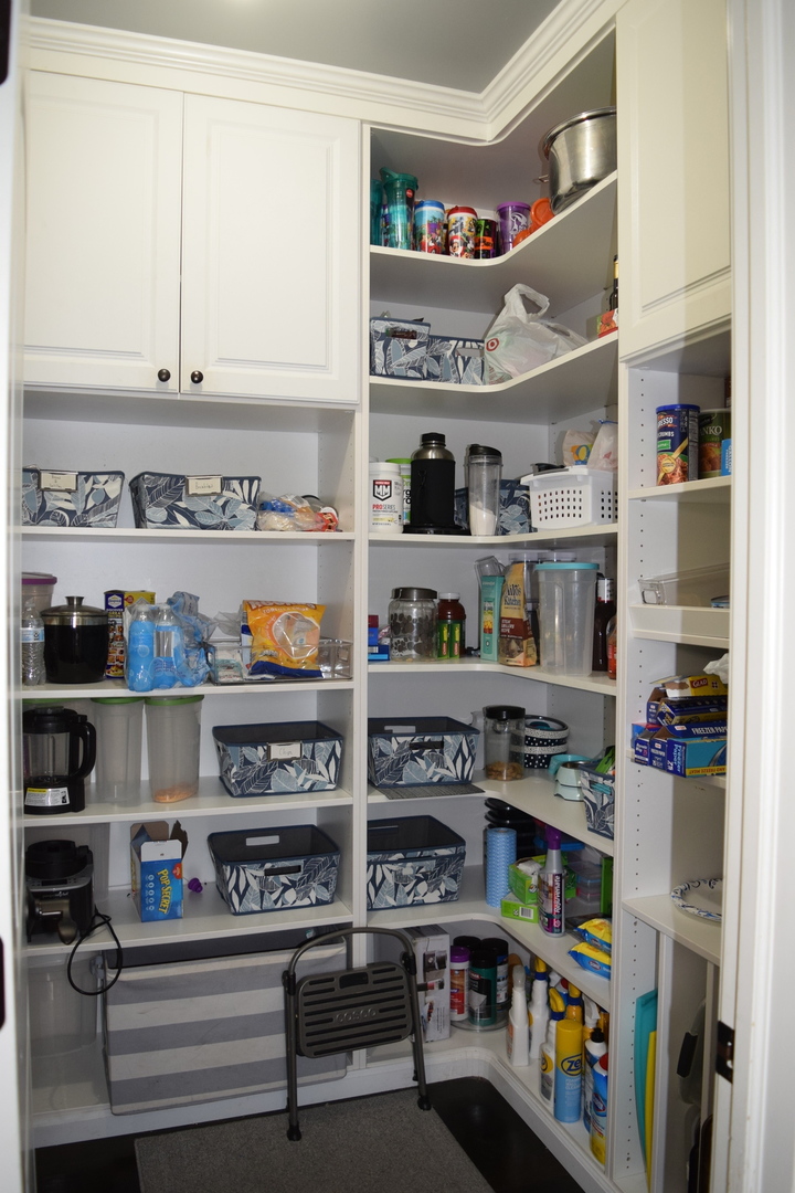 3003 Wayland Avenue Elgin, IL 60124 - Photo 6 of 32 a view of open kitchen with stainless steel appliances cabinets and empty shelves