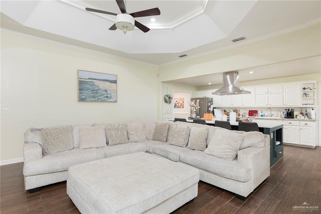 1902 Sundance Street Palmhurst, TX 78573 - Photo 11 of 43 a living room with furniture and kitchen view