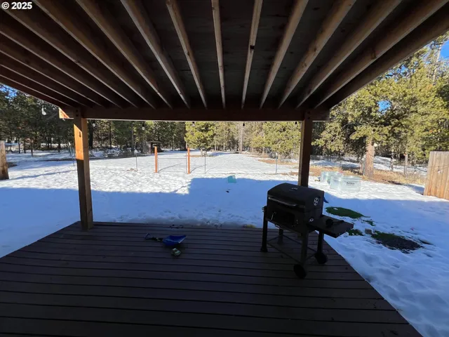 a view of balcony with wooden floor