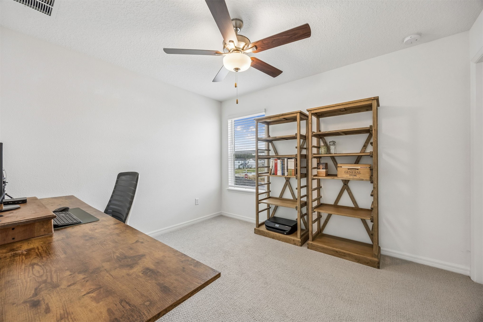 236 Hawthorn Park Circle Yulee, FL 32097 - Photo 18 of 28 a room with furniture and white walls