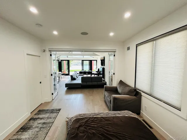 a bedroom with furniture and a couch