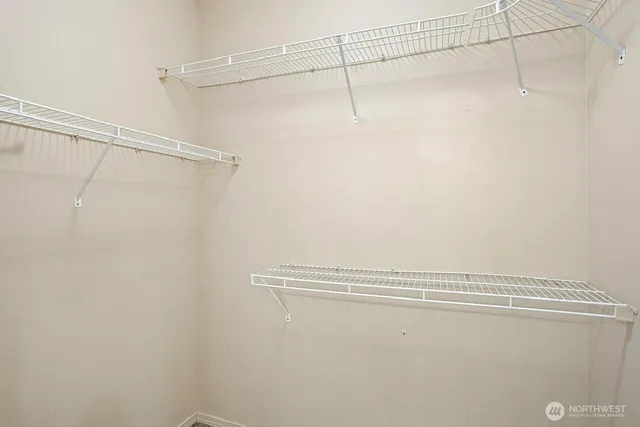 a view of a room with racks on the wall