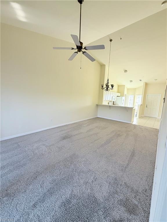 9175 Celeste Drive, Unit 2 Naples, FL 34113 - Photo 5 of 13 a view of a refrigerator in a room