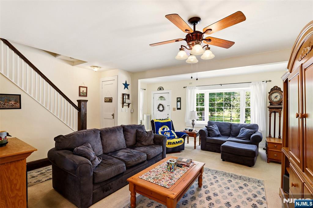 332 Riverside Avenue Lyndhurst, NJ 07071 - Photo 13 of 31 a living room with furniture and a large window