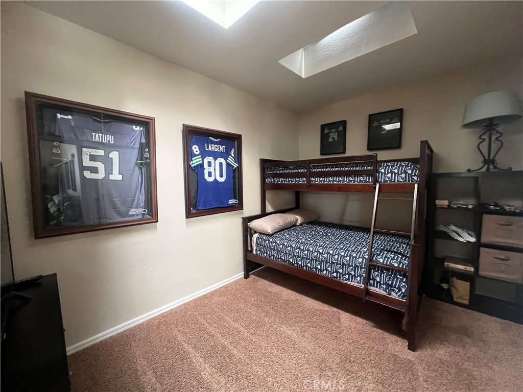 1189 Marina Drive Needles, CA 92363 - Photo 12 of 26 a bedroom with furniture and paintings