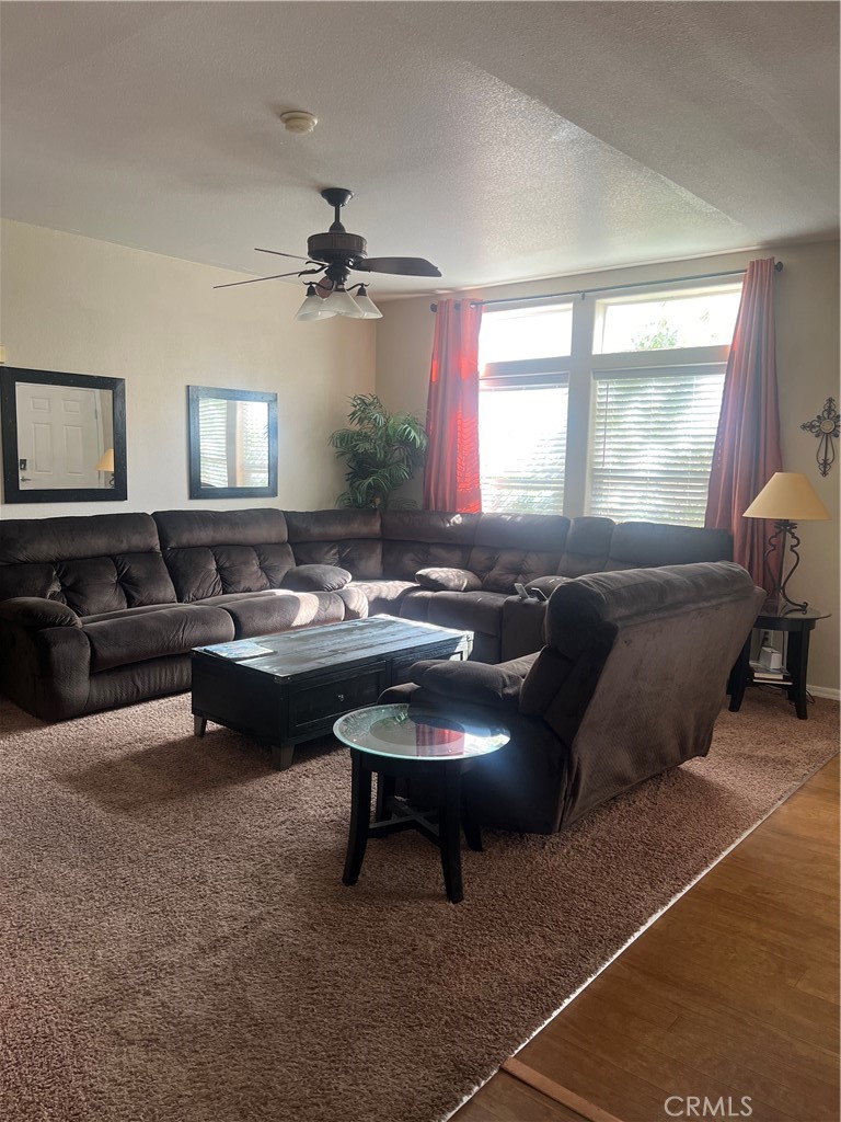 1189 Marina Drive Needles, CA 92363 - Photo 5 of 26 a living room with furniture and a large window