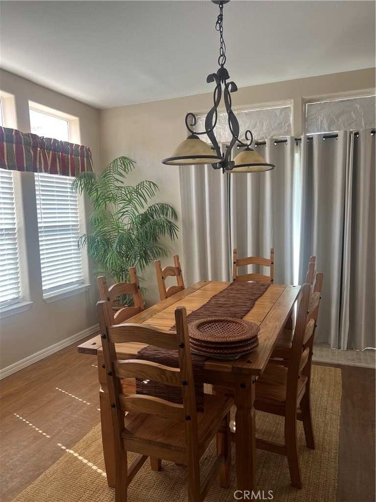 1189 Marina Drive Needles, CA 92363 - Photo 6 of 26 a view of a dining room with furniture and window