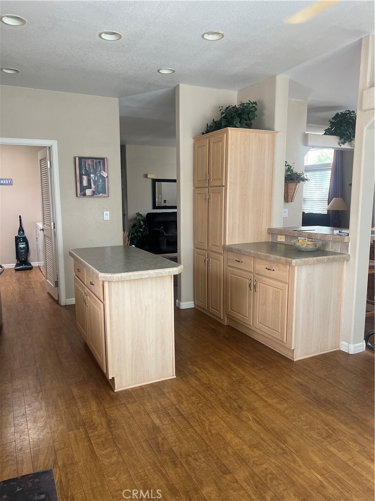 1189 Marina Drive Needles, CA 92363 - Photo 8 of 26 a kitchen with white cabinets and white appliances