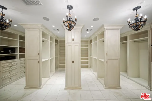 a view of a hallway with a chandelier